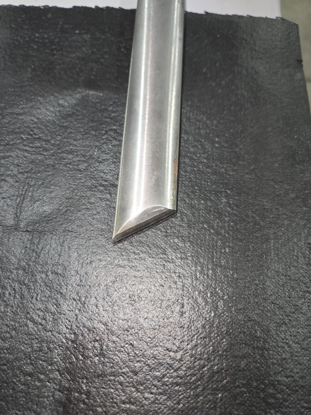 Woodturning tool with a sharp ground bevel after sharpening by Redeeming Edge
